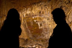 Couple admires formations at Glenwood Caverns