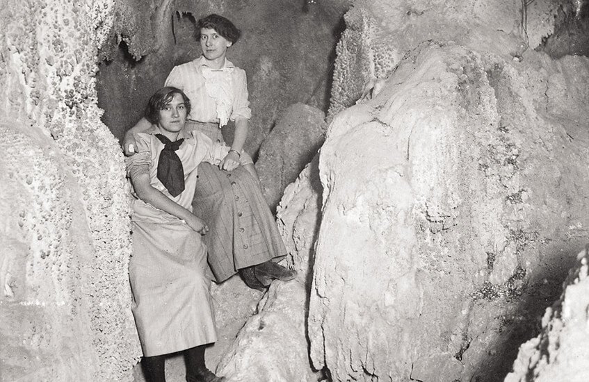 Historic photo of two ladies in cave at Glenwood Caverns