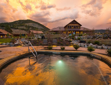 Heated pool at Iron Mountain Hot Springs at sunset